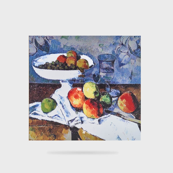 Fruit bowl, glass and apples